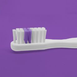 Detalle del corte de cepillo dental viajero