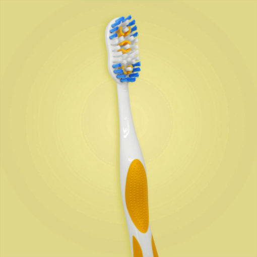 cepillo dental para adultos color amarillo con masajeadores dentales